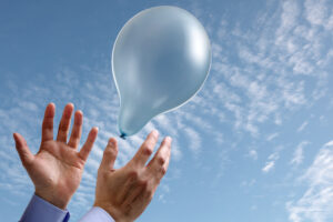 Releasing,a,balloon,into,the,air,concept,for,dreams,and